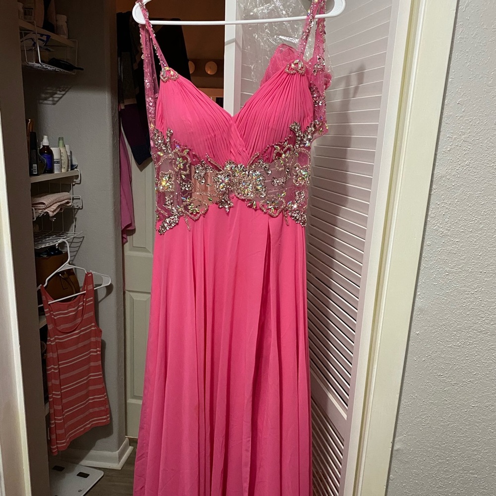 Hot pink floor length dress.
